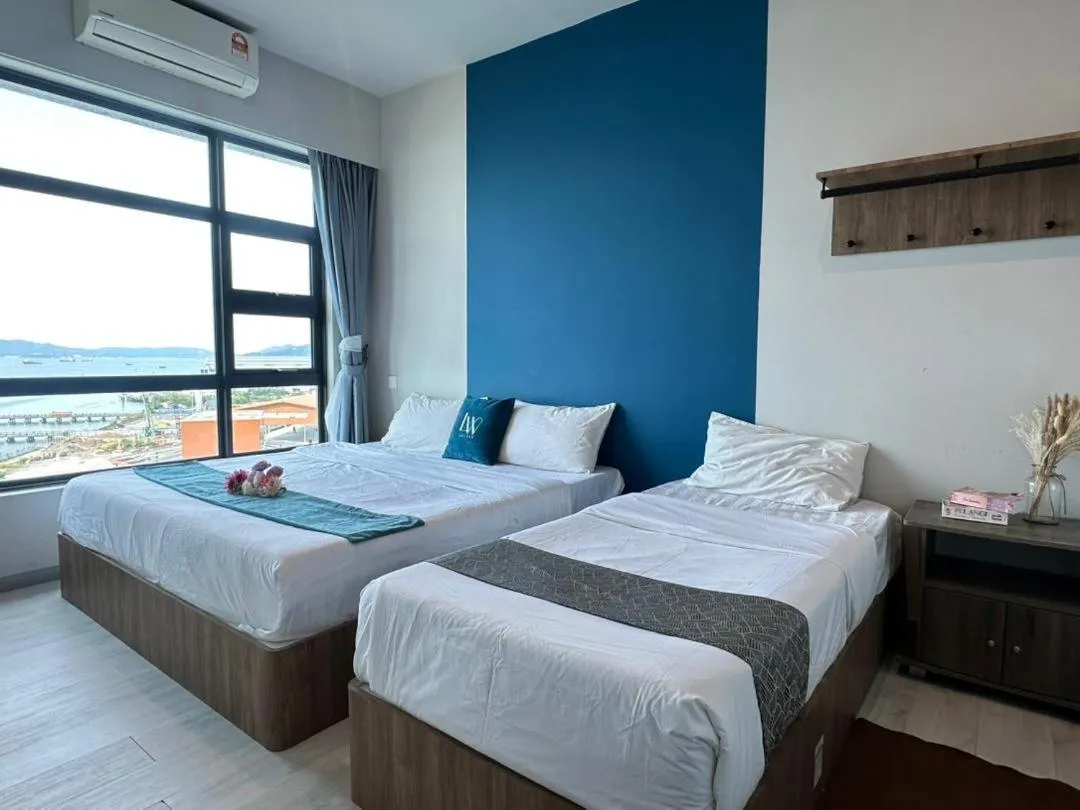 Bed in Jesselton Quay Kota Kinabalu City Centre by LW Suites