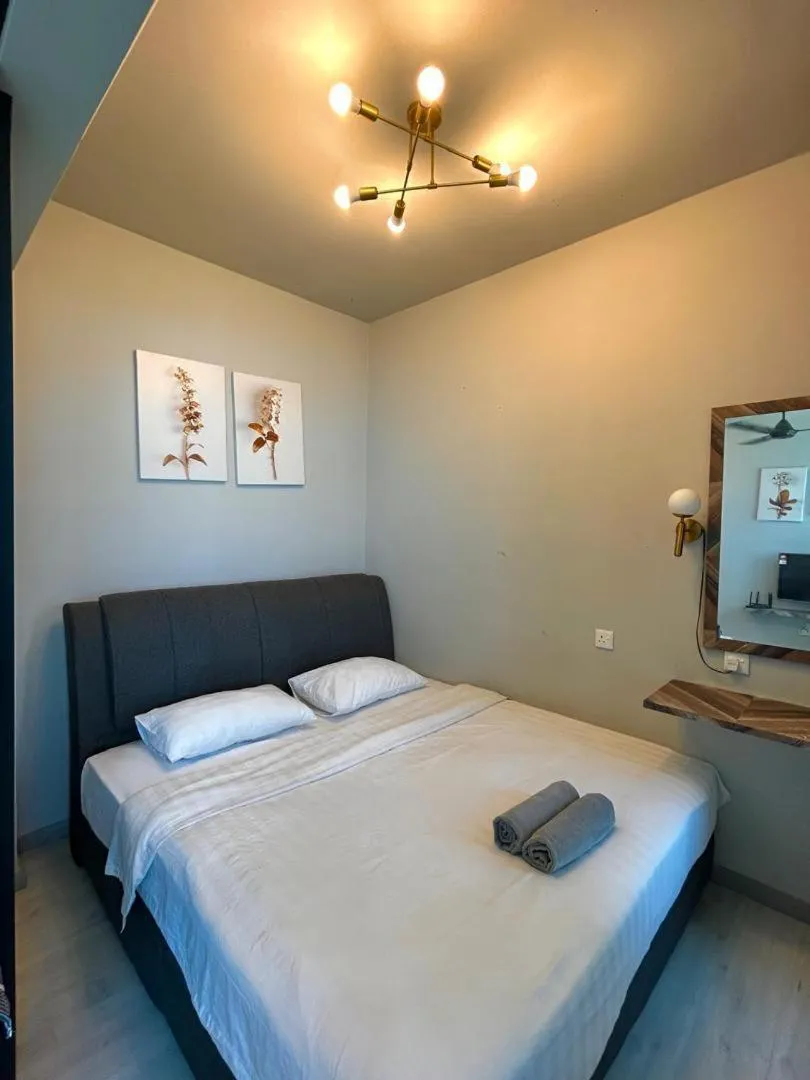 Bed in Jesselton Quay Kota Kinabalu City Centre by LW Suites