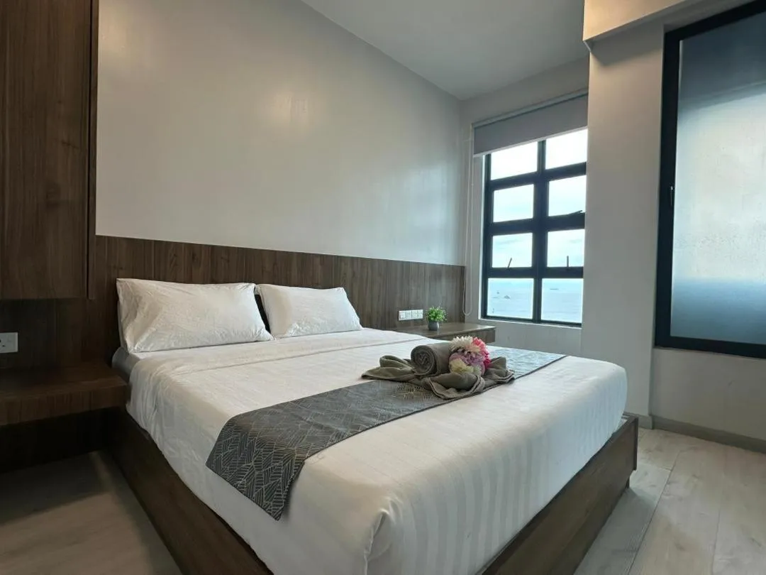 Bed in Jesselton Quay Kota Kinabalu City Centre by LW Suites