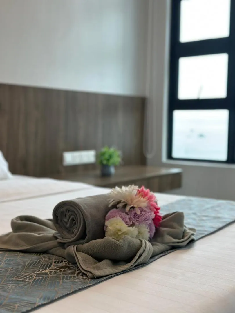 Bed in Jesselton Quay Kota Kinabalu City Centre by LW Suites