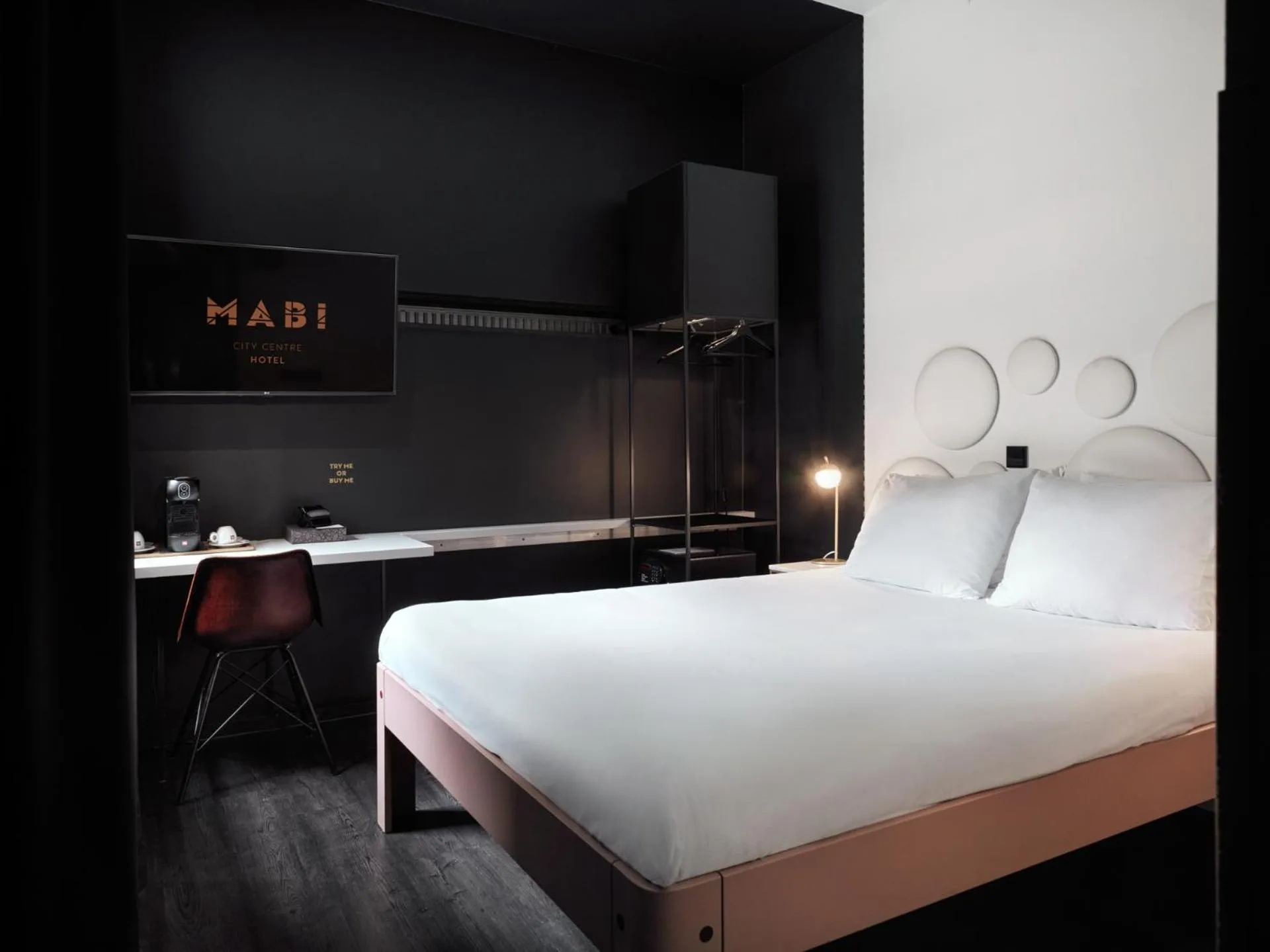 Photo of the whole room, Bed in MABI City Centre