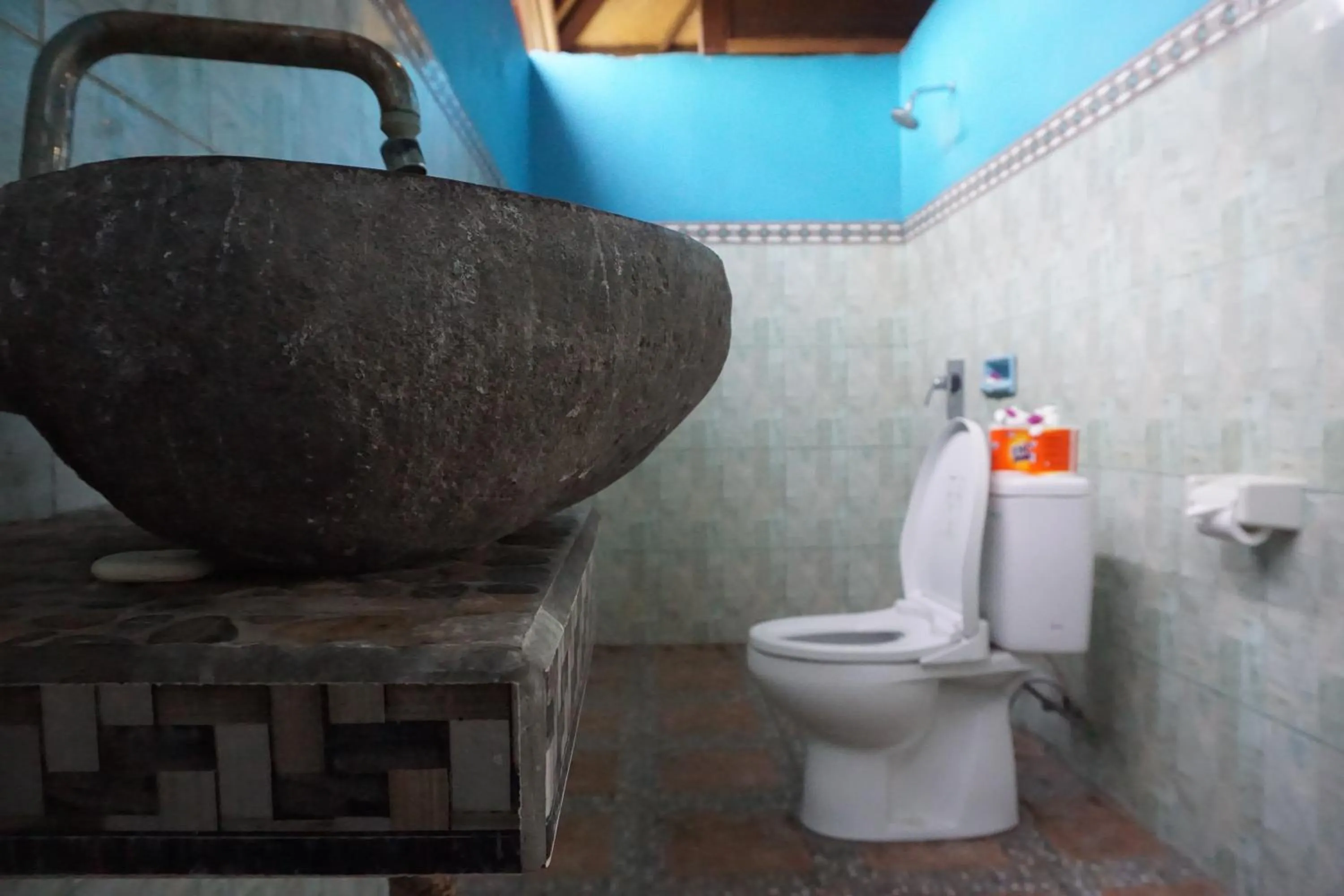 Bathroom in Nyoman Guesthouse and Grill