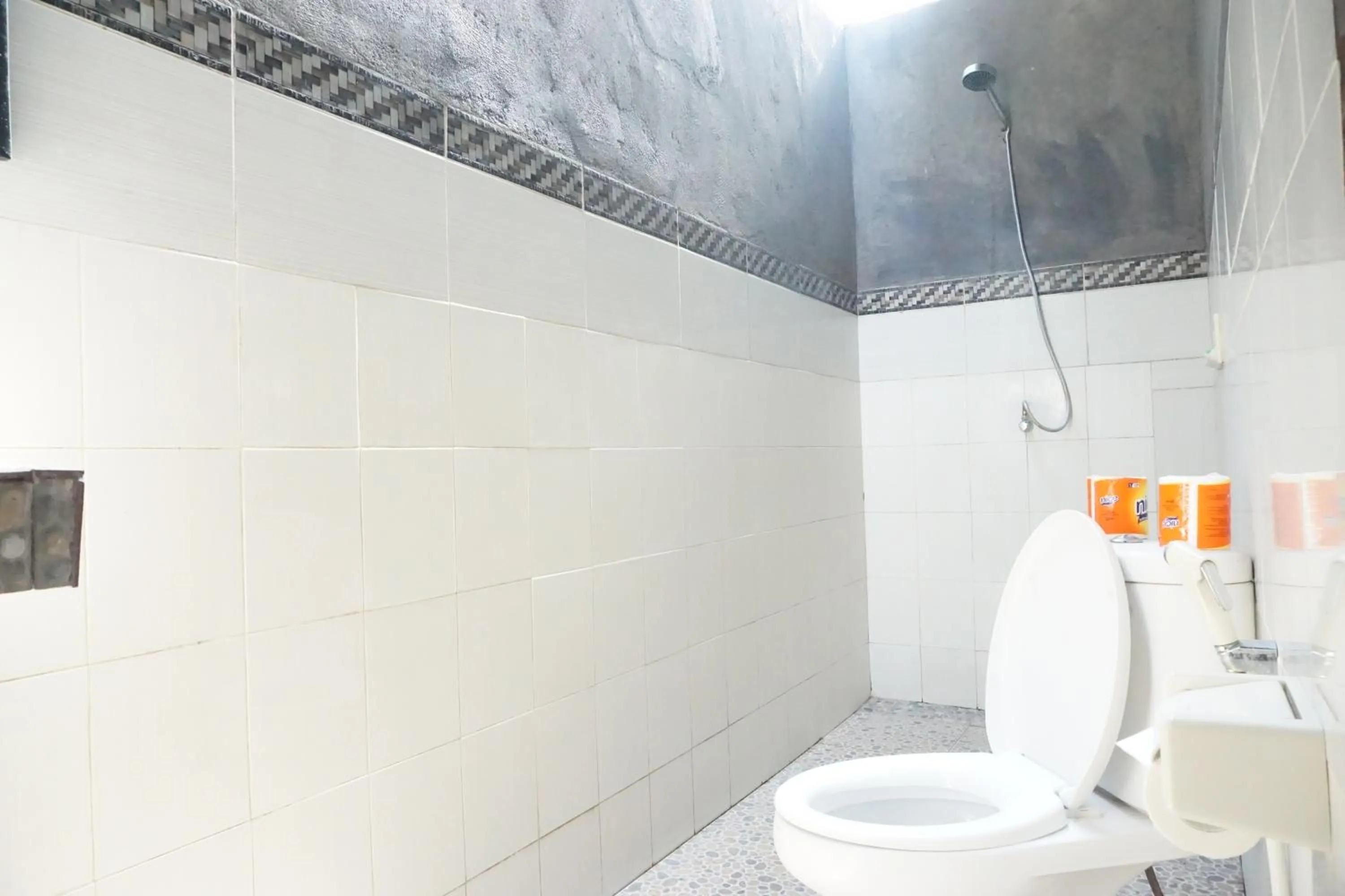 Bathroom in Nyoman Guesthouse and Grill