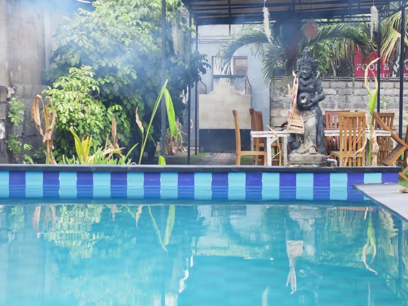Swimming pool in Nyoman Guesthouse and Grill
