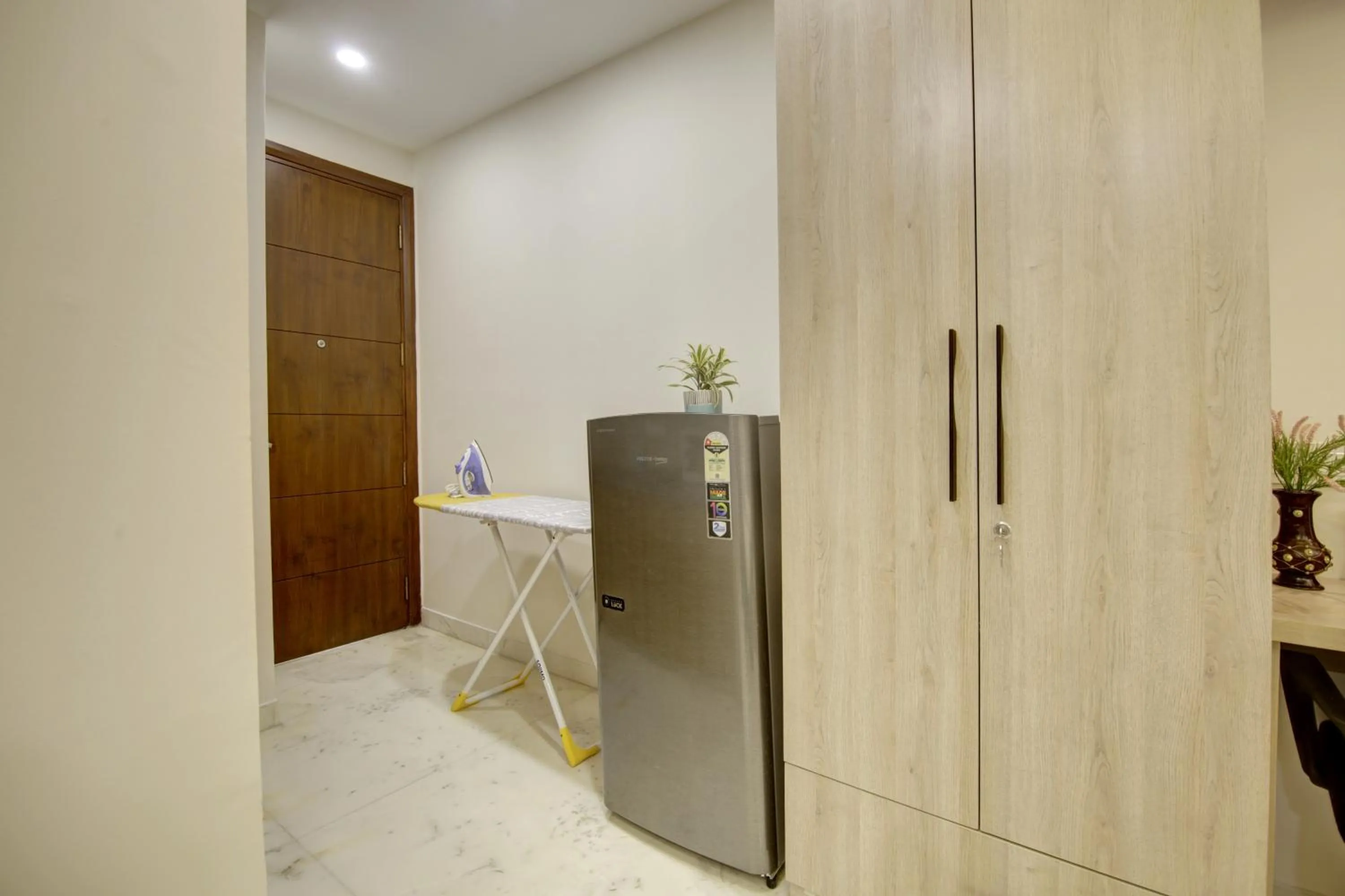 Kitchen or kitchenette in FlxHo Quad - Luxury Studio Apart Hotel DLF Cyber City