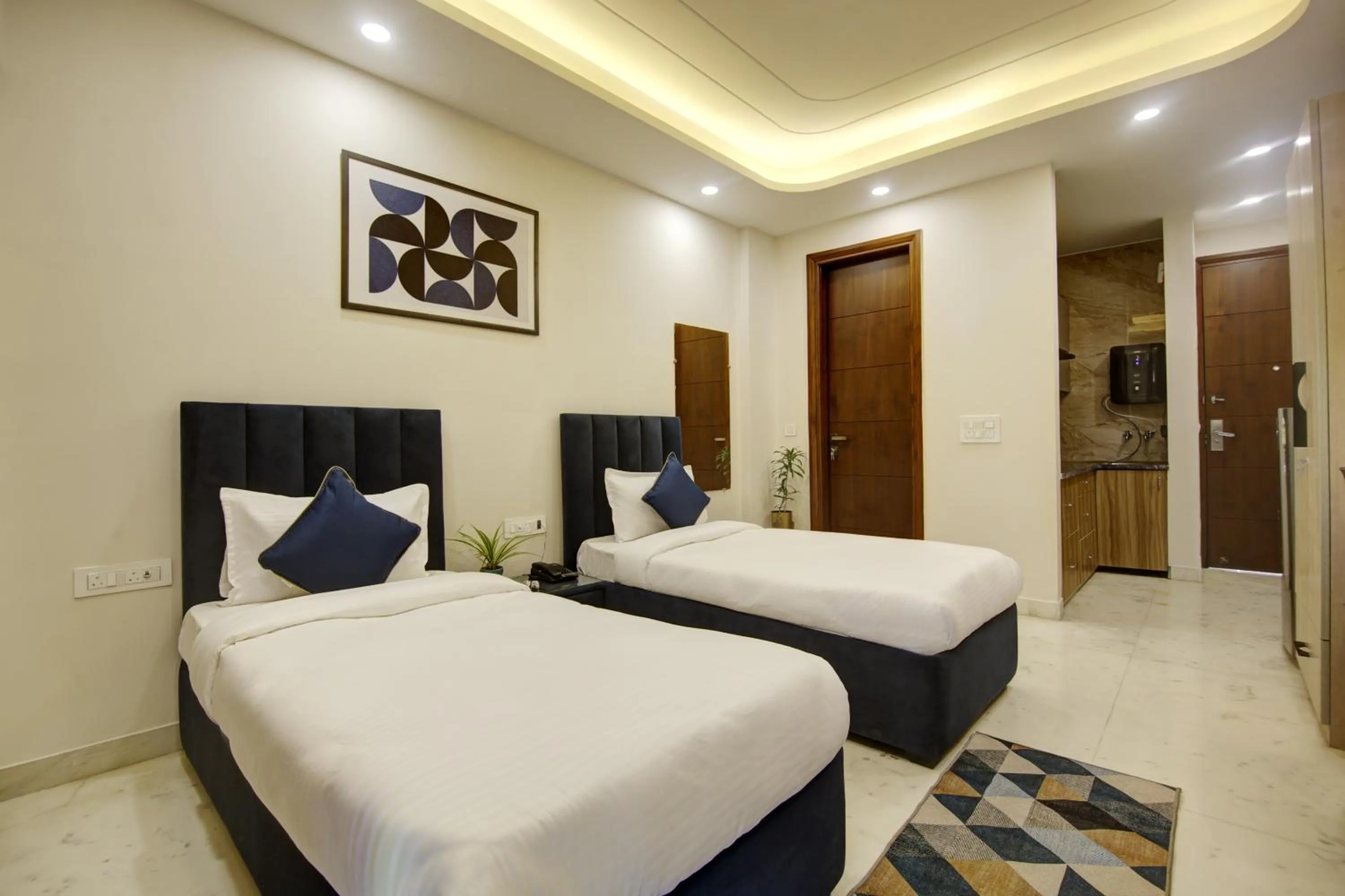 Bed in FlxHo Quad - Luxury Studio Apart Hotel DLF Cyber City