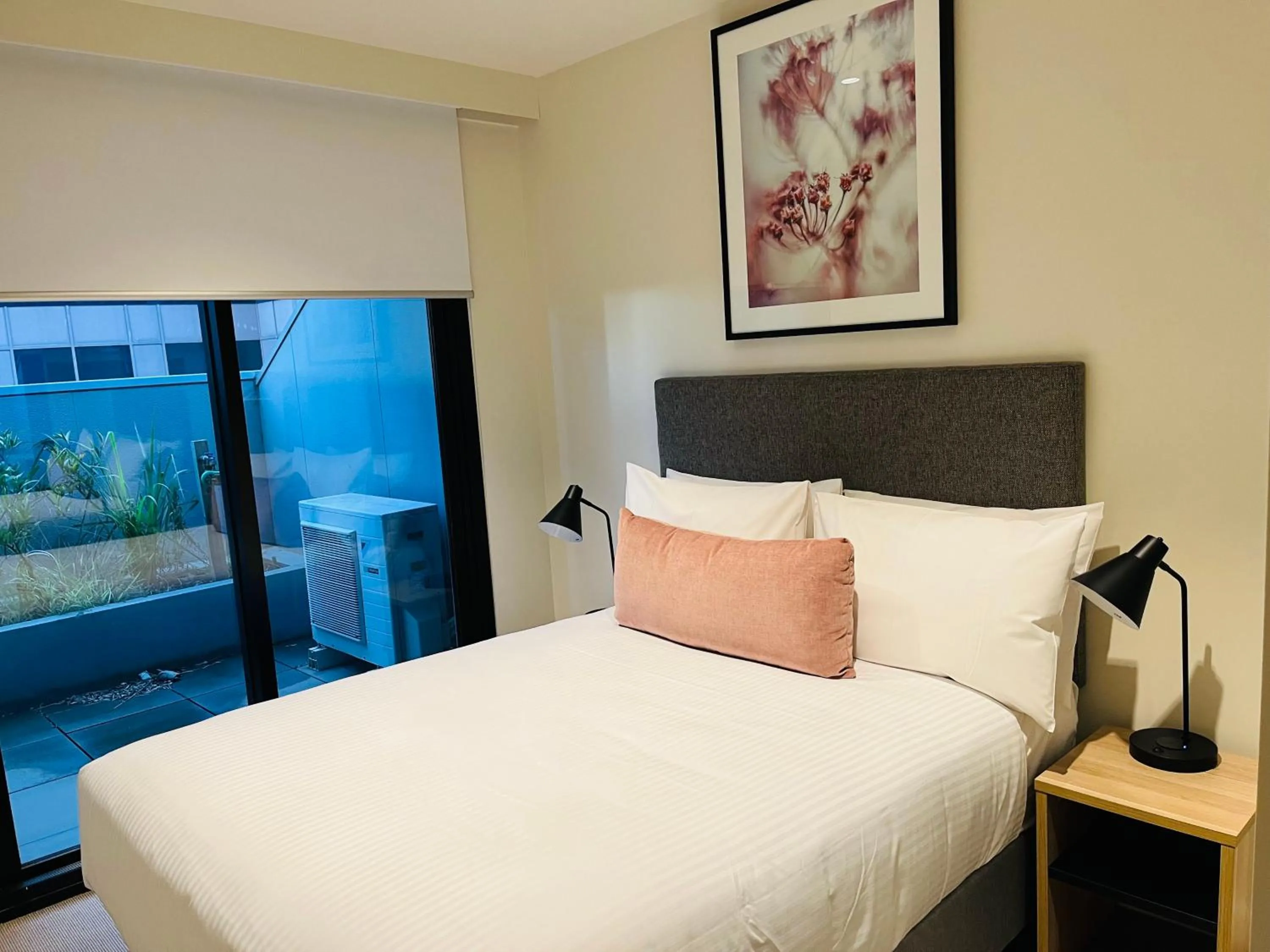 Bed in Wyndham Hotel Melbourne