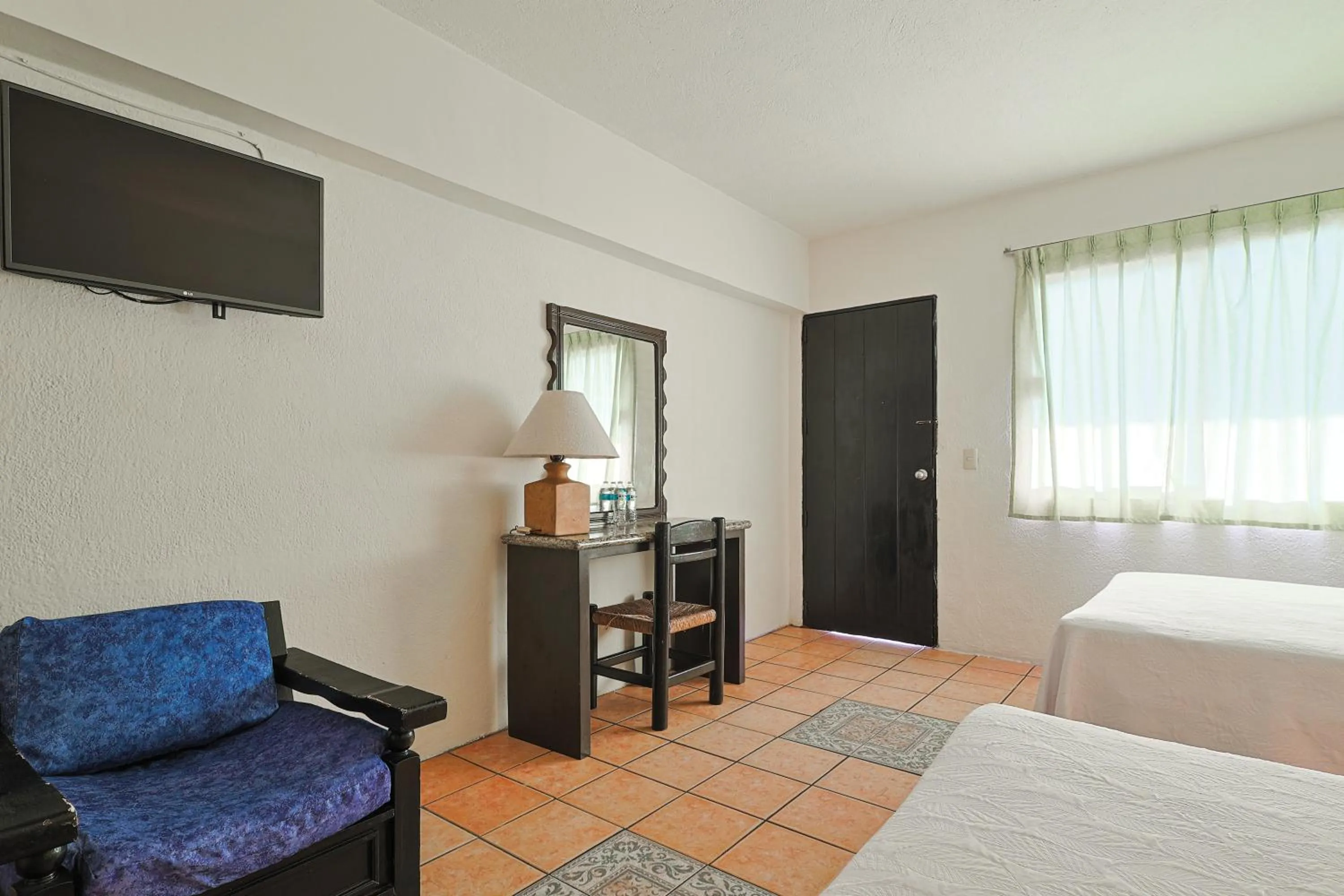 Seating area, Bed in Hotel Delfín Vista Pier Beach Front