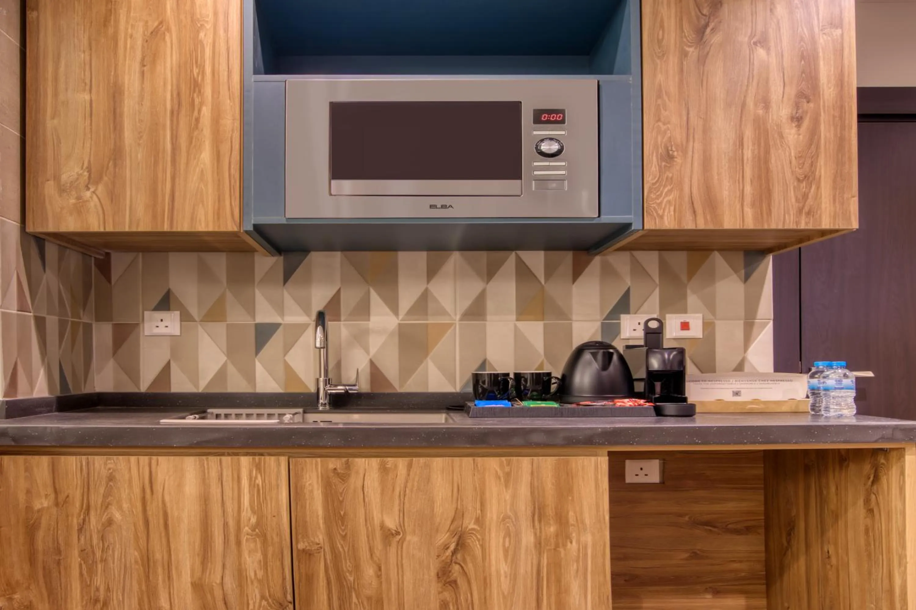 Kitchen or kitchenette in Aluya Hotel