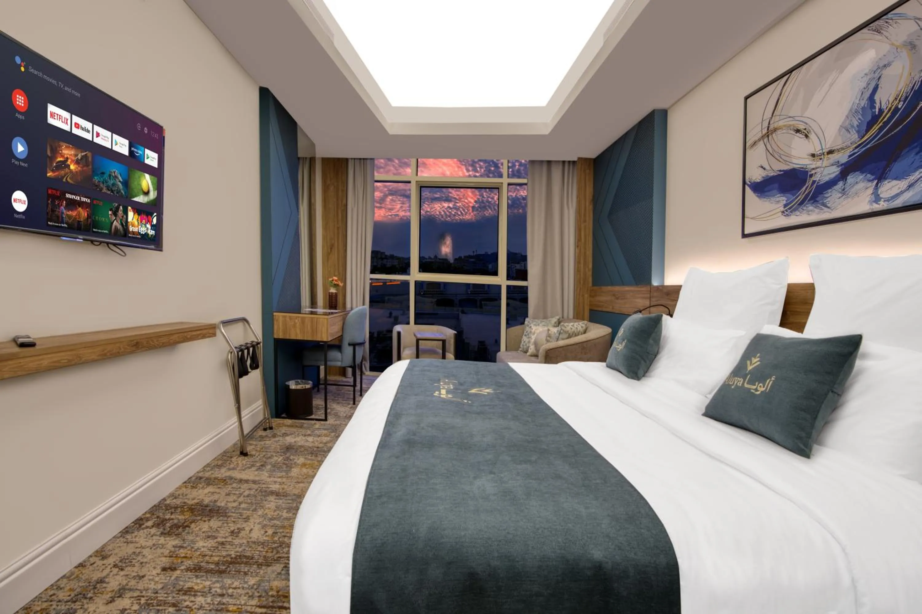 Seating area, Bed in Aluya Hotel