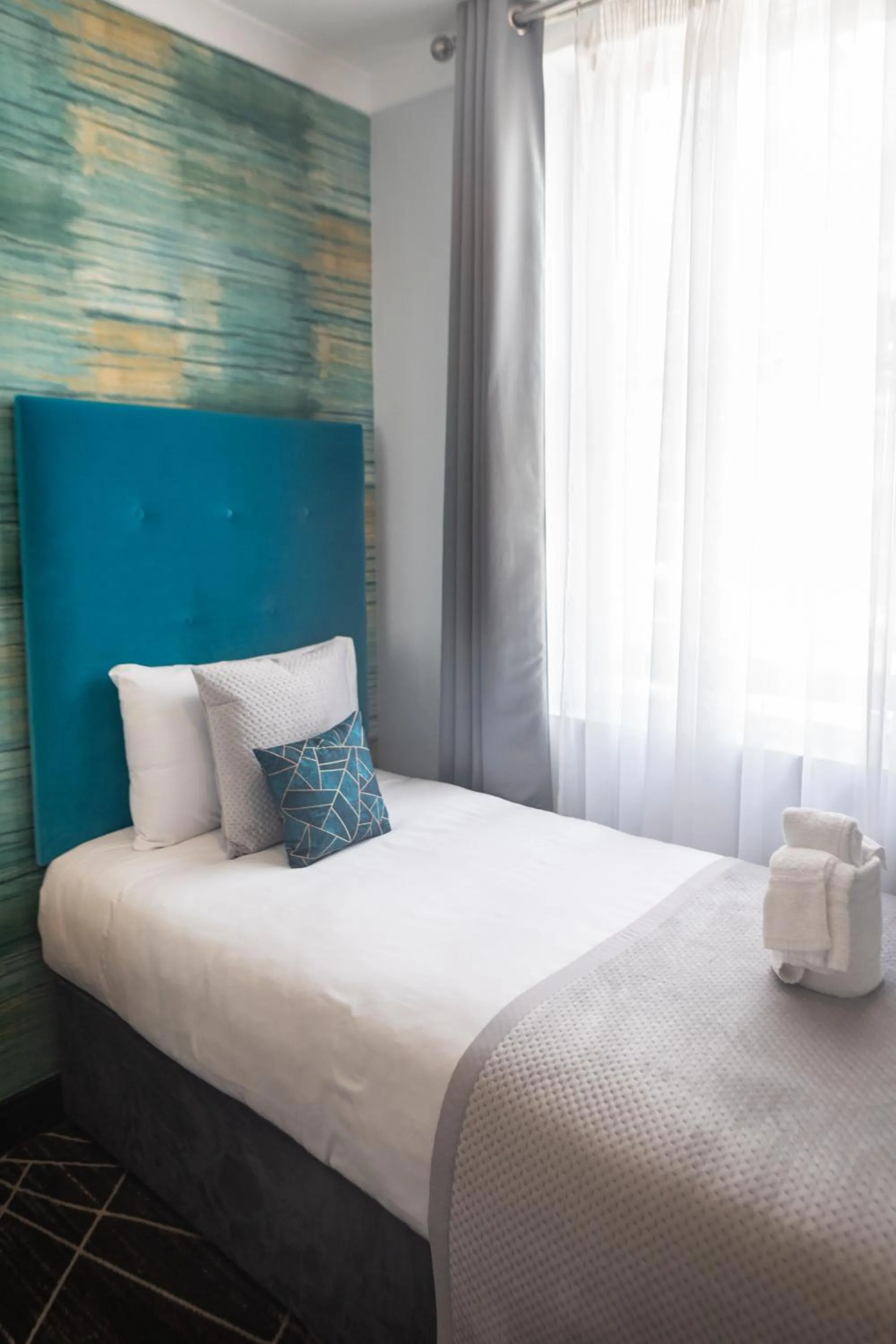 Bed in Paddington Park Hotel