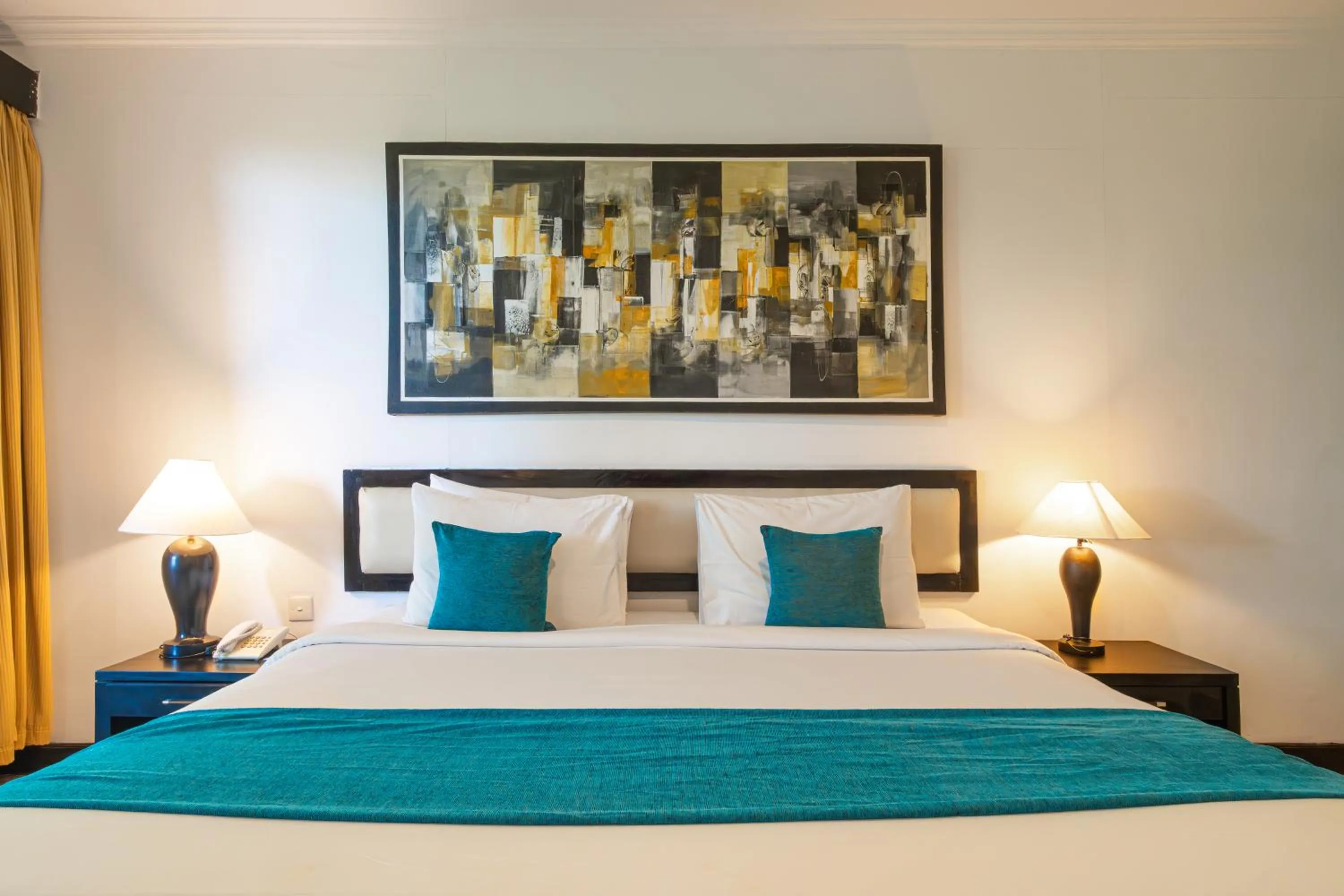 Bed in Blue Point Resort and Spa