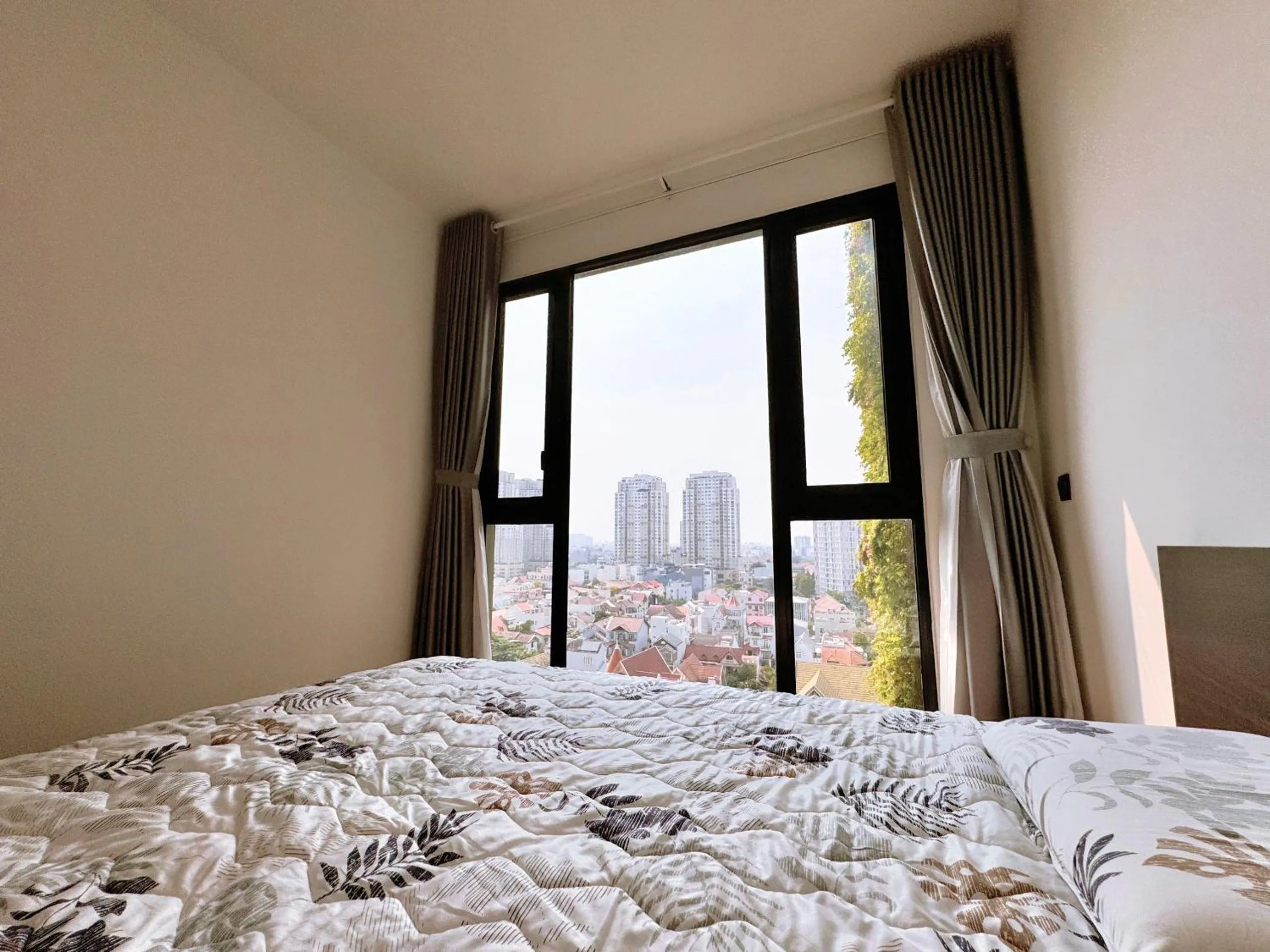 Bed in Homie's Dedge Thao Dien Luxury Apartment