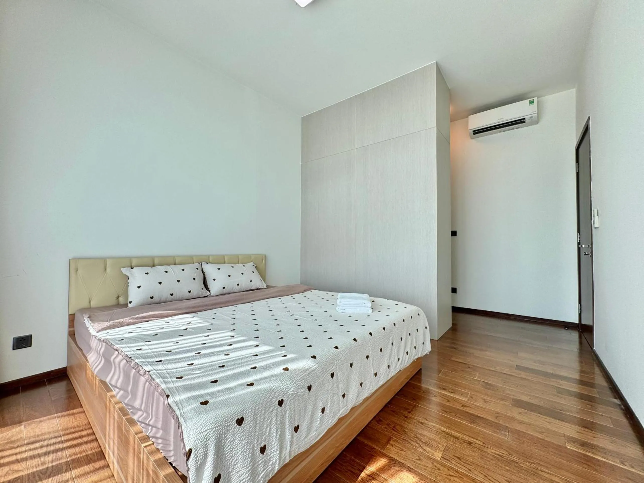 Bed in Homie's Dedge Thao Dien Luxury Apartment