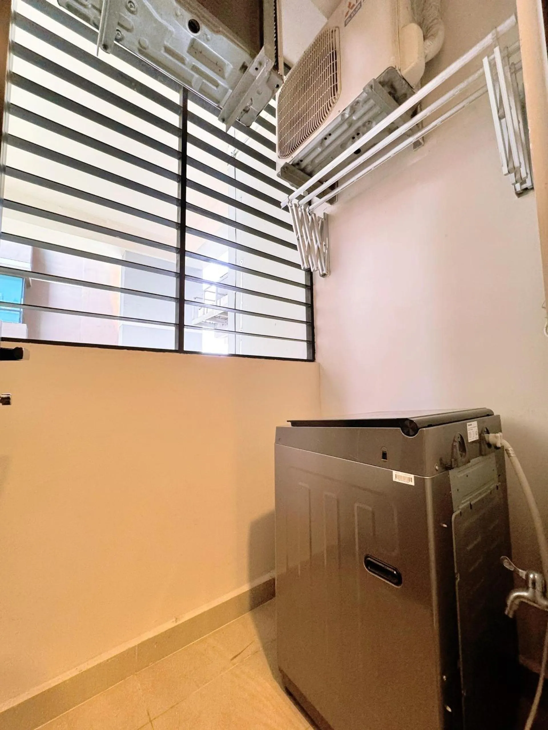 washing machine in Homie's Dedge Thao Dien Luxury Apartment