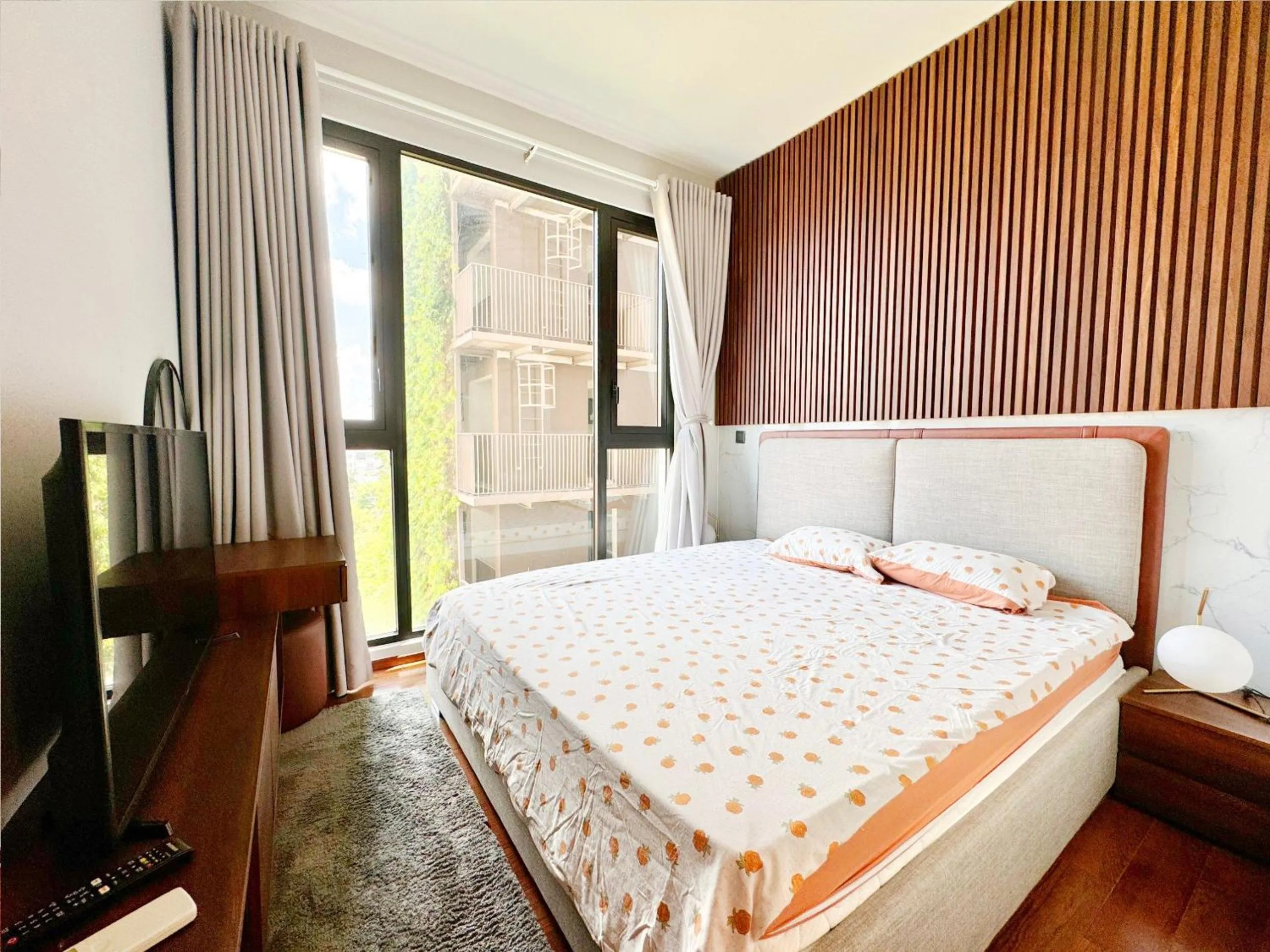 Bed in Homie's Dedge Thao Dien Luxury Apartment