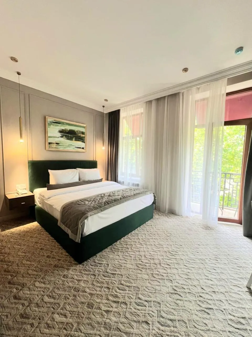 Bed in Maestro Address Hotel