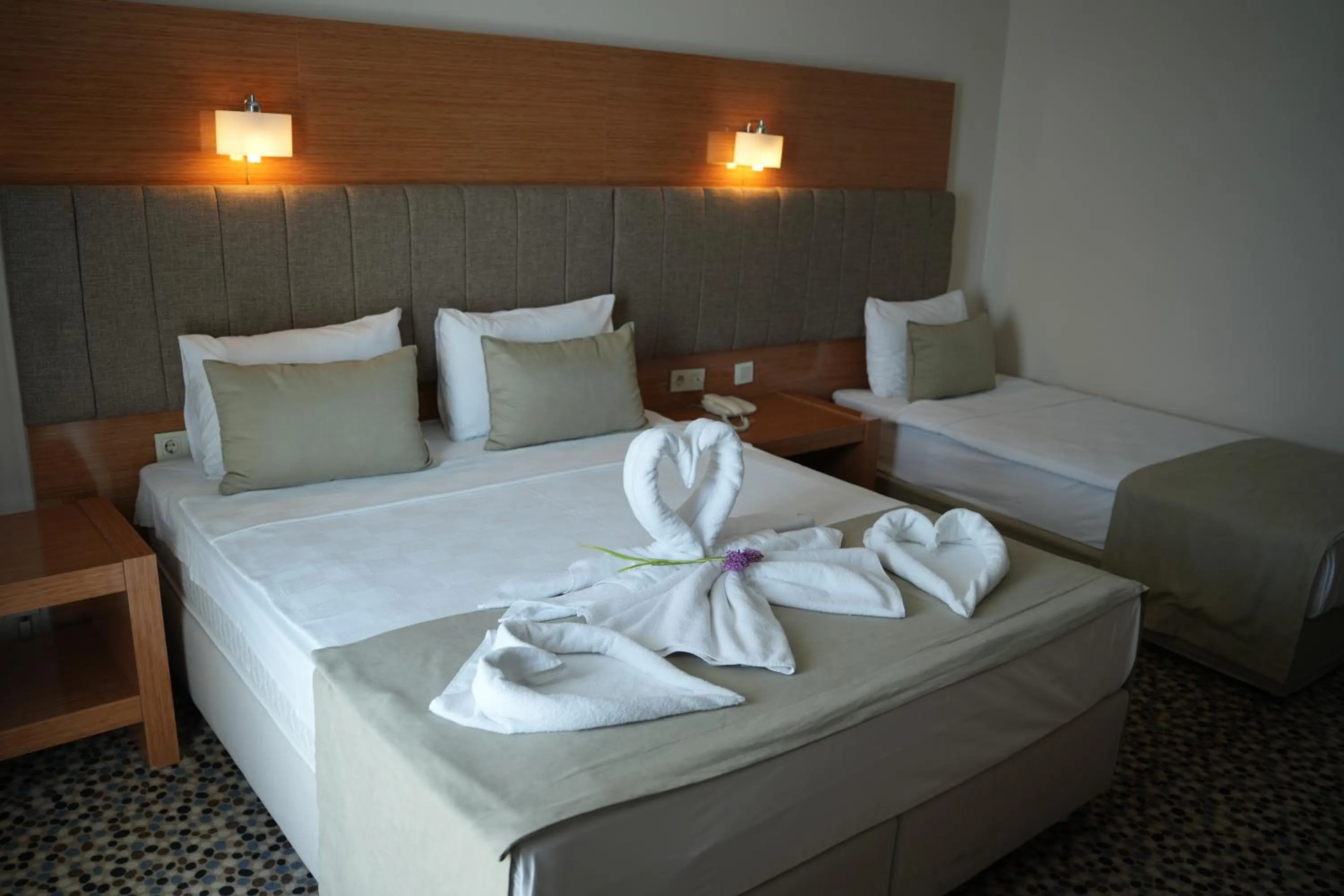 Bed in Ada Newday Resort Hotel