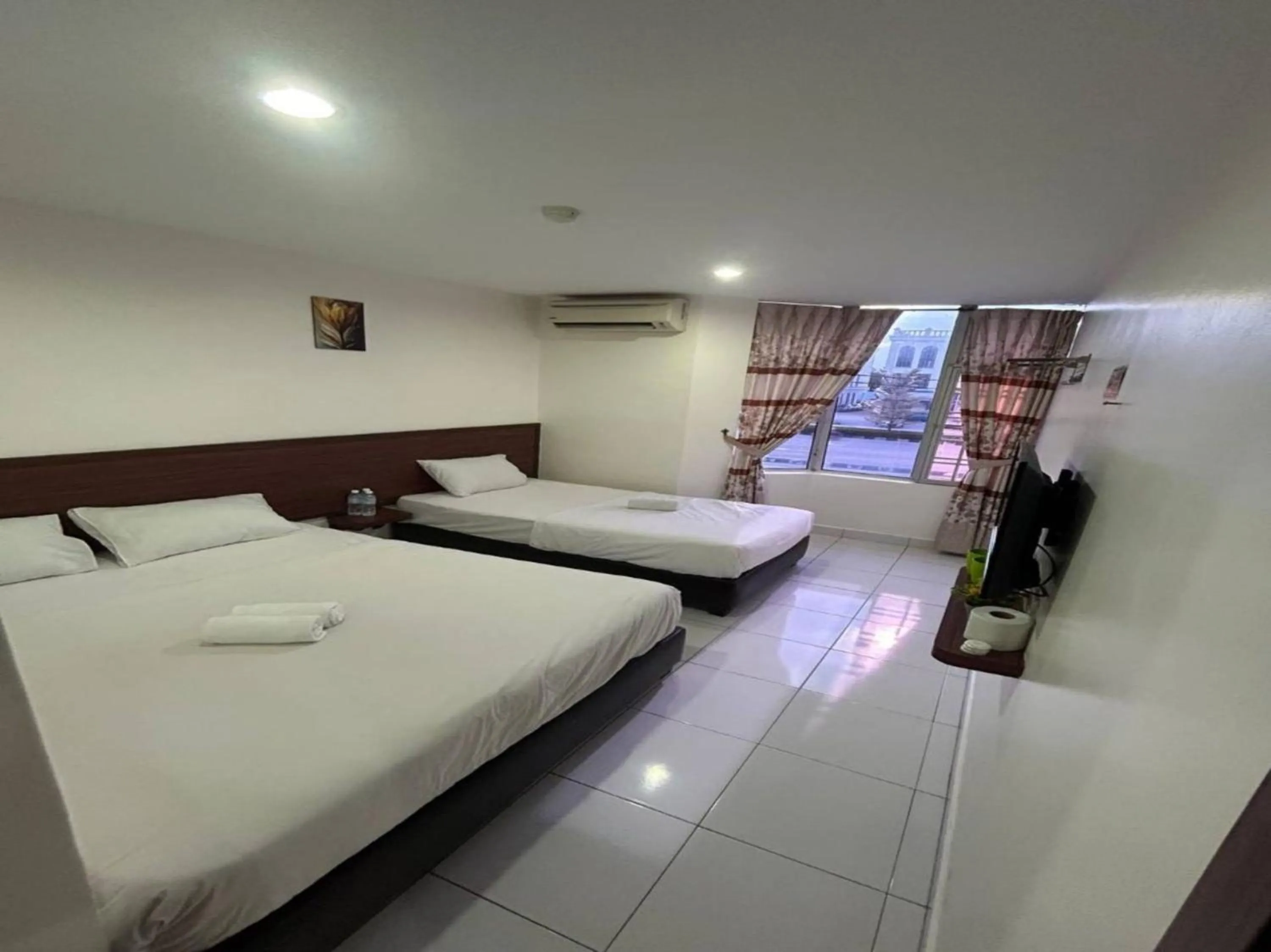 Bedroom in OYO 90950 Hotel Dns