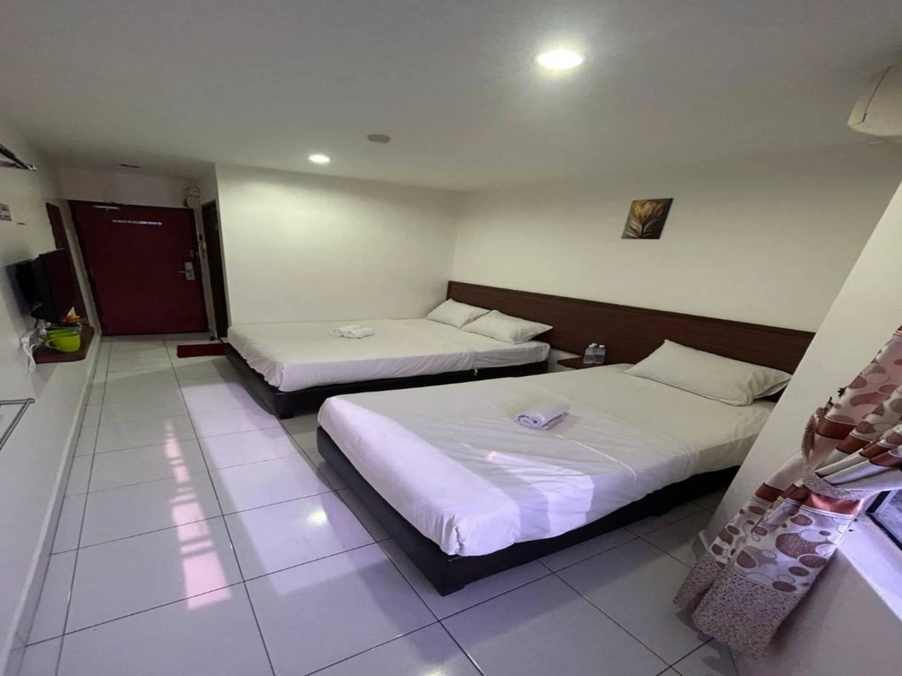 Bedroom in OYO 90950 Hotel Dns