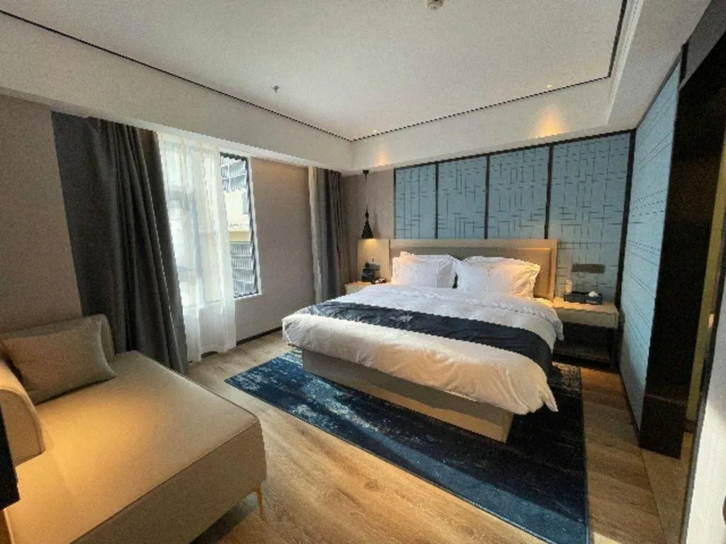 Bed in Echarm Hotel Changjiang Shilu