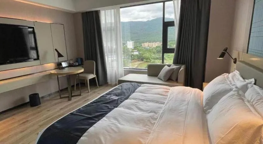 Bed in Echarm Hotel Changjiang Shilu