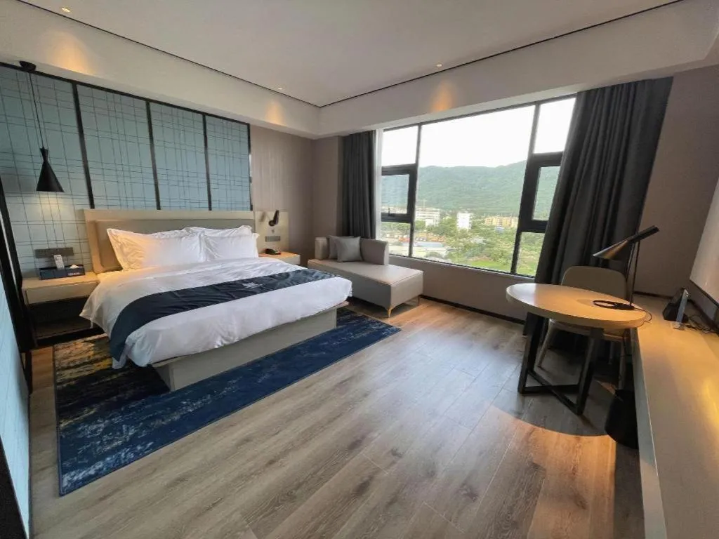Bed in Echarm Hotel Changjiang Shilu