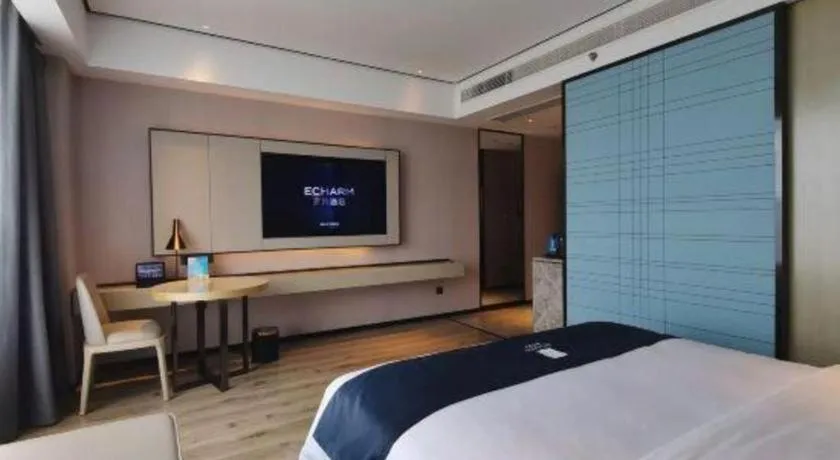 Bed in Echarm Hotel Changjiang Shilu
