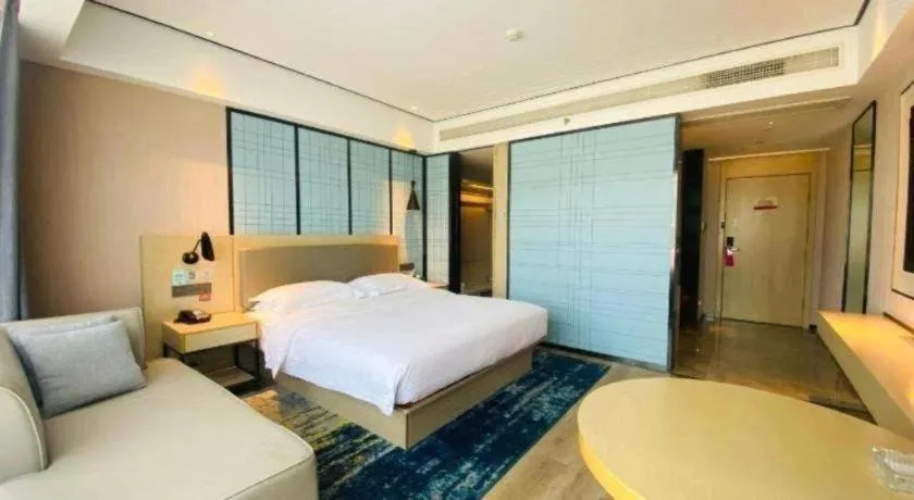 Bed in Echarm Hotel Changjiang Shilu