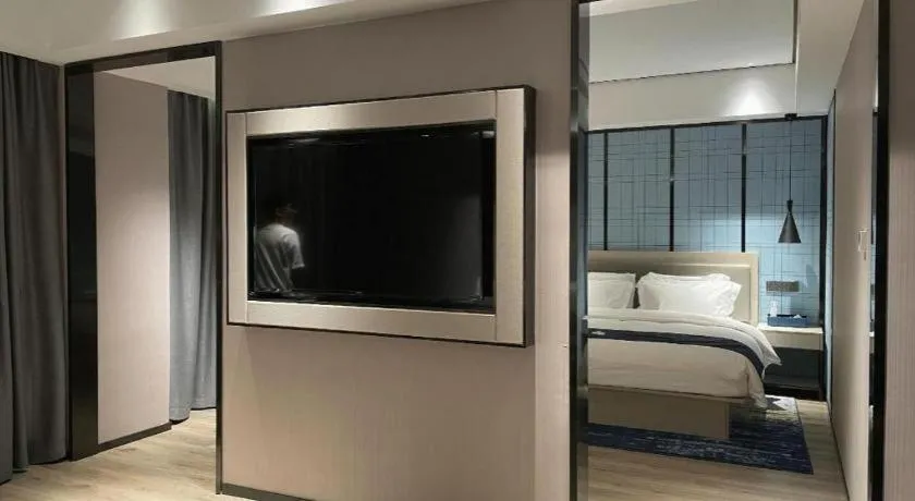 Bed in Echarm Hotel Changjiang Shilu