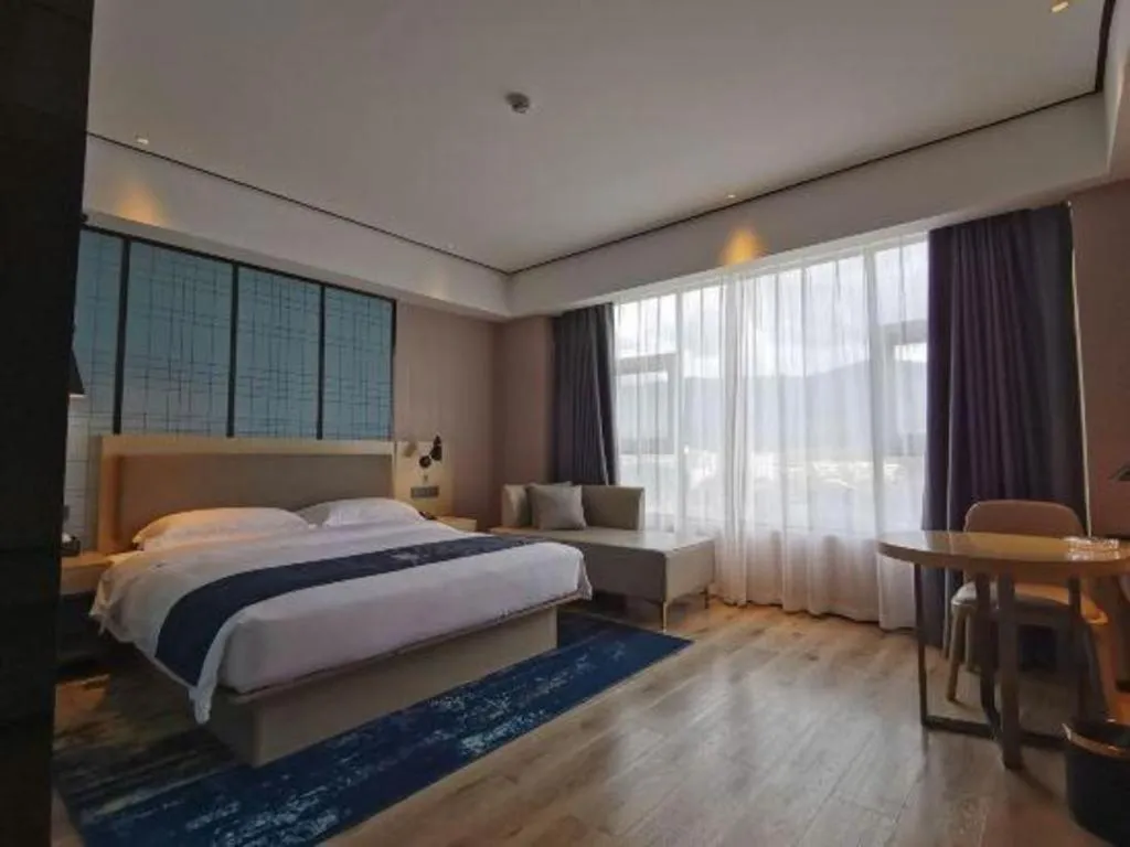 Bed in Echarm Hotel Changjiang Shilu
