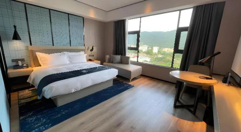 Bed in Echarm Hotel Changjiang Shilu