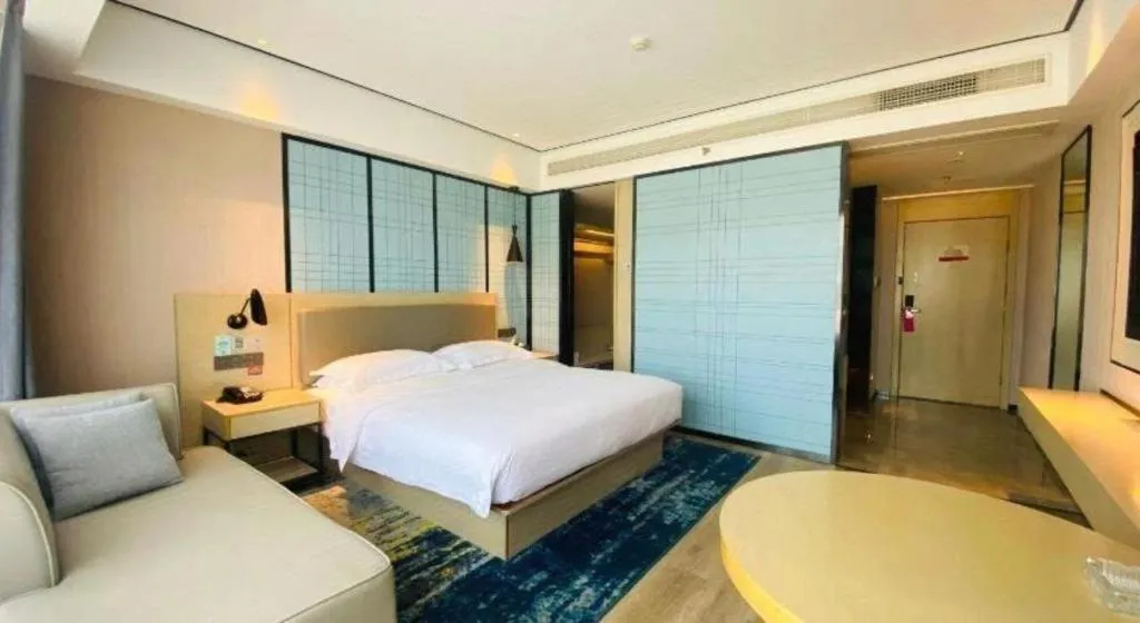 Bed in Echarm Hotel Changjiang Shilu