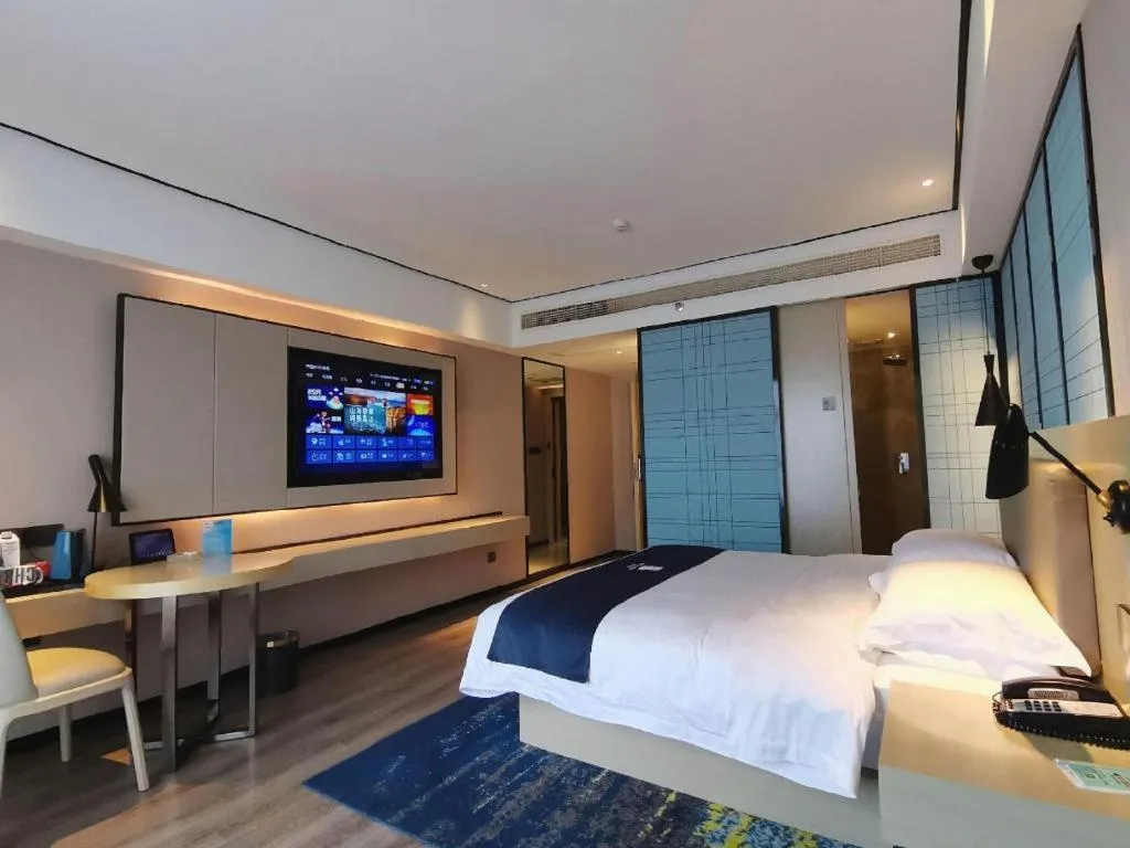 Bed in Echarm Hotel Changjiang Shilu