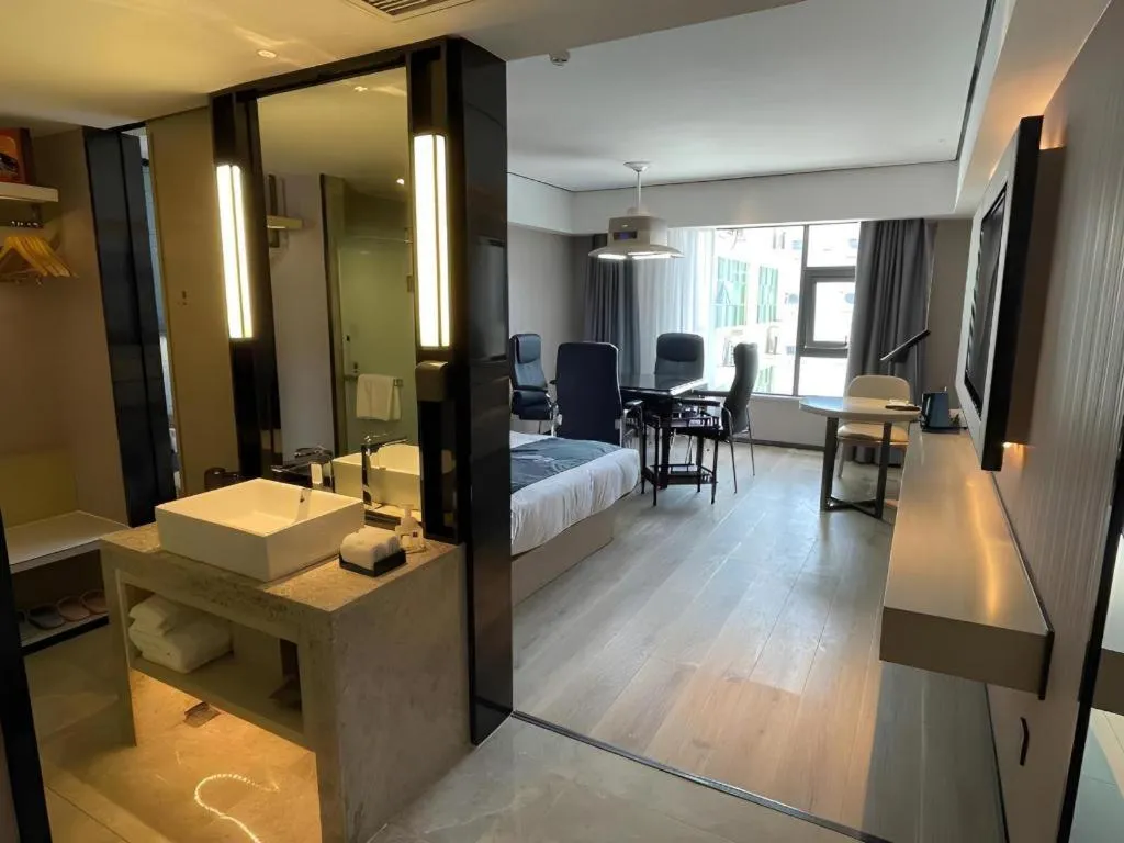 Bed in Echarm Hotel Changjiang Shilu