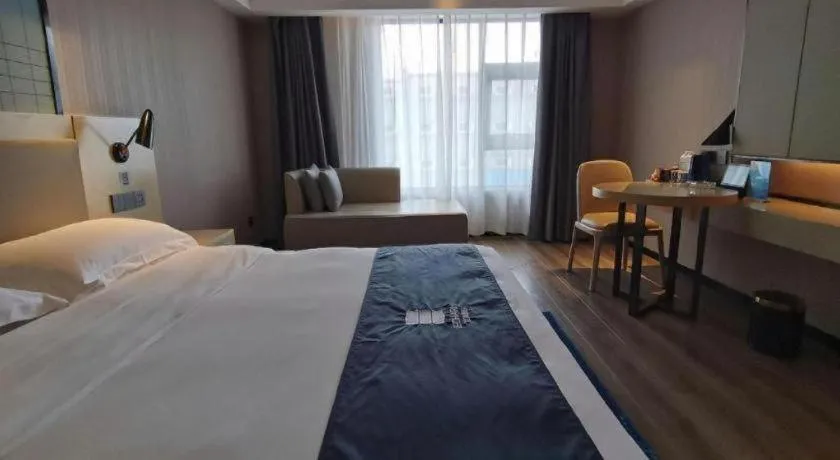 Bed in Echarm Hotel Changjiang Shilu