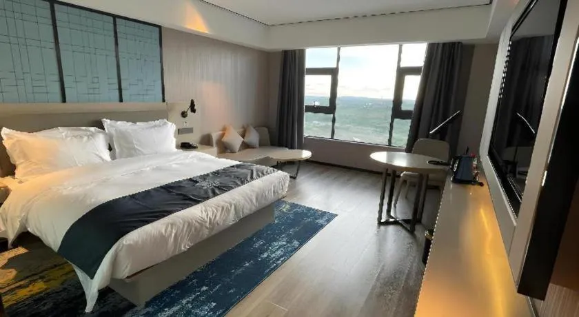 Bed in Echarm Hotel Changjiang Shilu