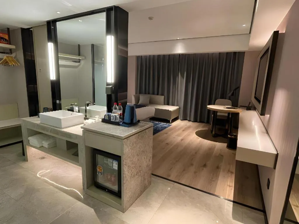 Bed in Echarm Hotel Changjiang Shilu