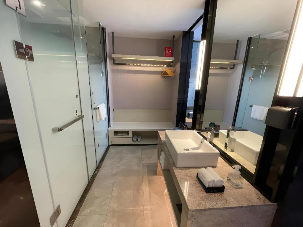 Bed in Echarm Hotel Changjiang Shilu