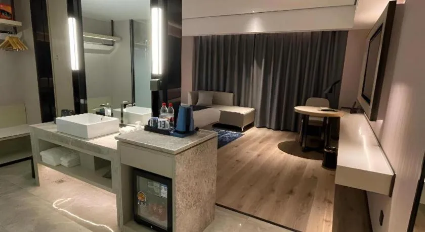 Bed in Echarm Hotel Changjiang Shilu