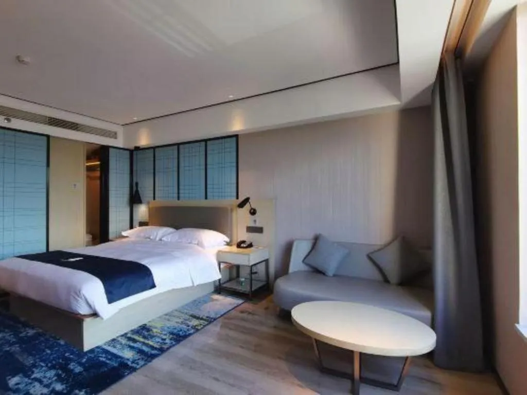 Bed in Echarm Hotel Changjiang Shilu