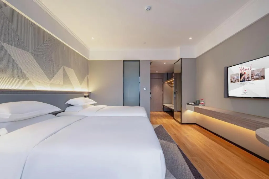 Bed in Borrman Hotel Nanning Wuming Center