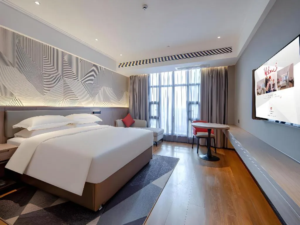 Bed in Borrman Hotel Nanning Wuming Center