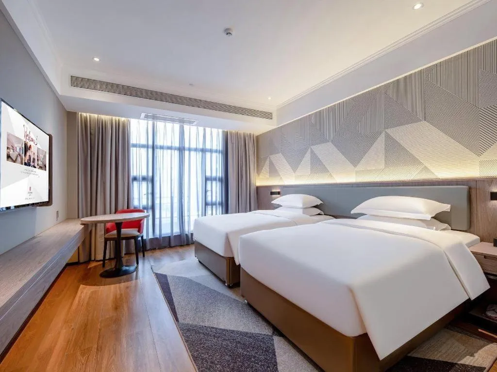 Bed in Borrman Hotel Nanning Wuming Center