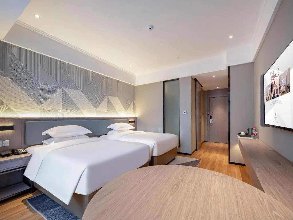 Bed in Borrman Hotel Nanning Wuming Center