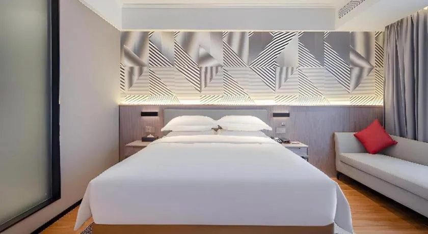 Bed in Borrman Hotel Nanning Wuming Center