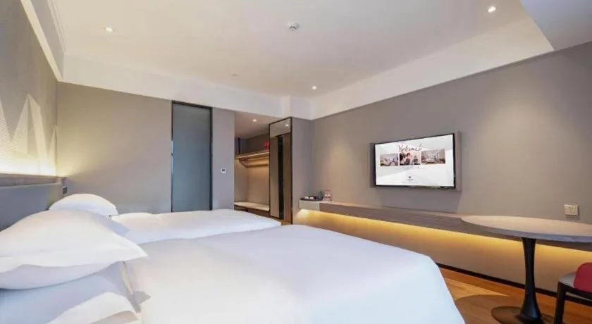 Bed in Borrman Hotel Nanning Wuming Center