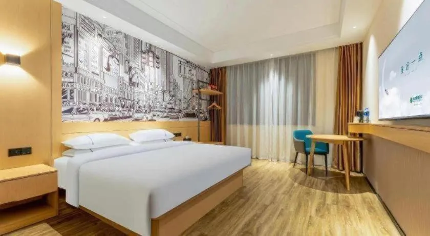 Bed in City Comfort Inn Wuhan Yangluo Wanda Plaza