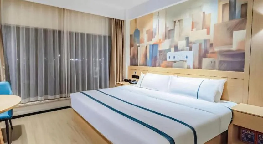 Bed in City Comfort Inn Wuhan Yangluo Wanda Plaza