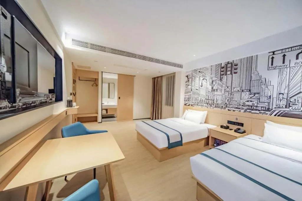 Bed in City Comfort Inn Wuhan Yangluo Wanda Plaza